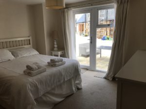 Burton House master bedroom and rear patio